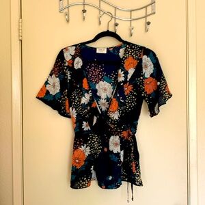 Navy blue floral blouse.